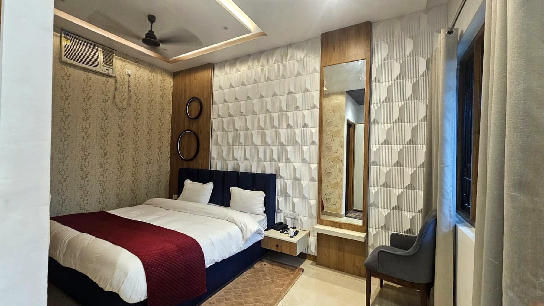 Guest room at The Gautam Hotel